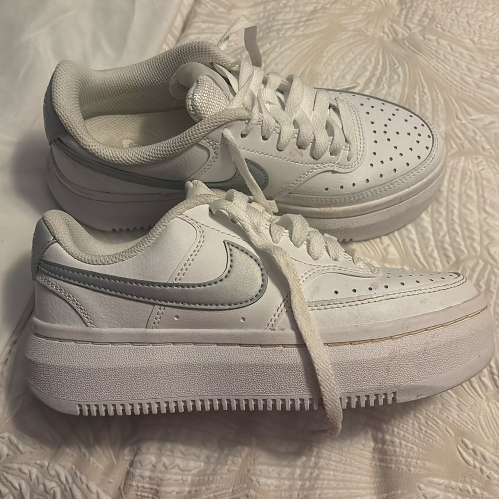White platform Nike sneakers with grey Nike check. Size women’s 5.5